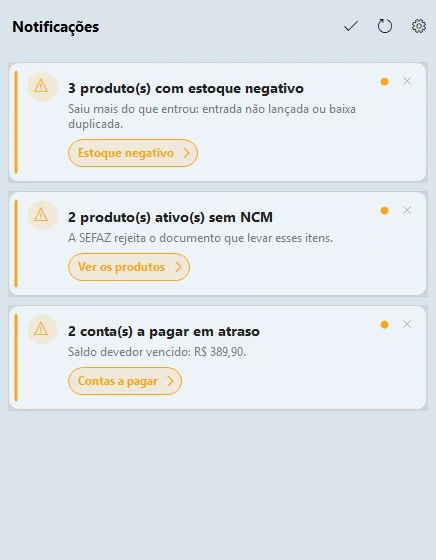 Avisos da Central de Notificações: produtos com estoque negativo, produtos ativos sem NCM e contas a pagar em atraso, cada um com um botão que leva para a tela certa